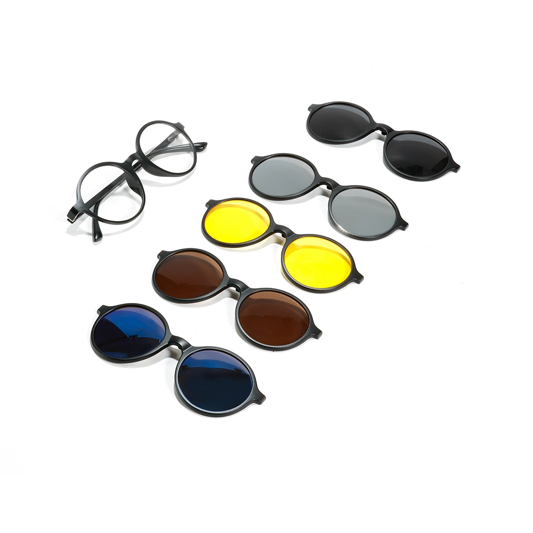 Flat lay view of Lume round TR90 magnetic clip-on eyeglasses set with interchangeable clip-on lenses RR0112601 in black