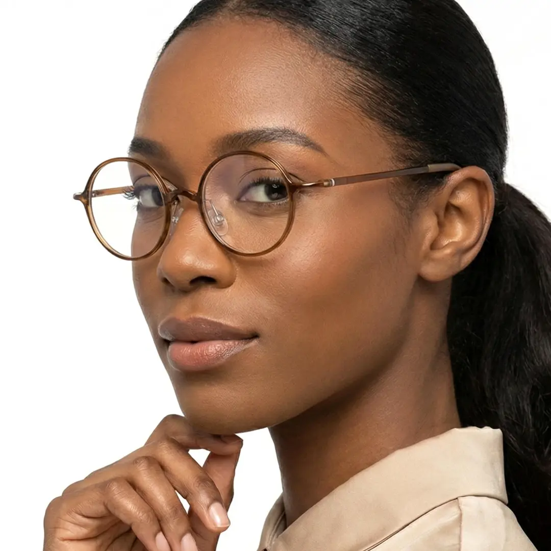 Female wearing john lennon brown round tr90 eyeglasses, neutral expression. SPU: RR0192410