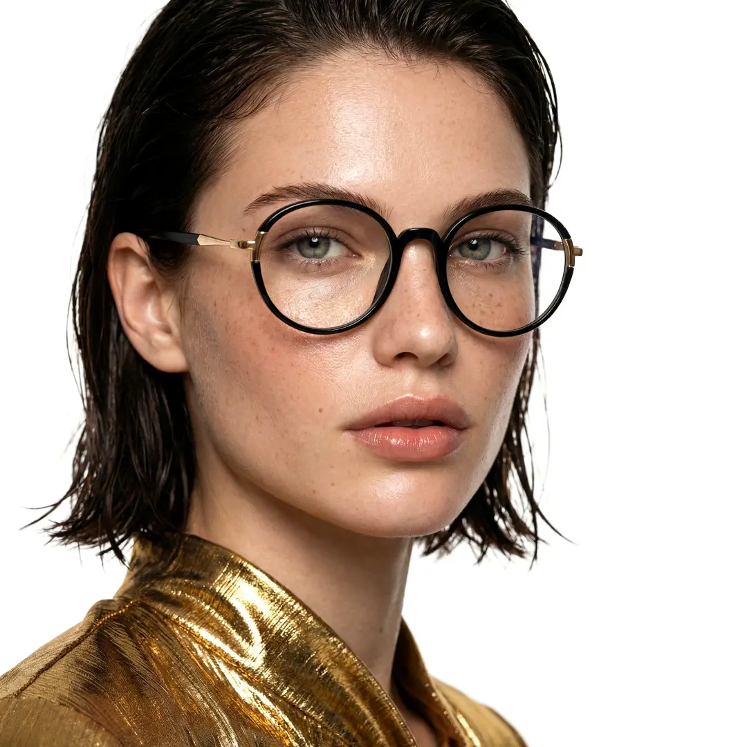 Over-the-shoulder view of female wearing black round eyeglasses, calm expression, RR0262411