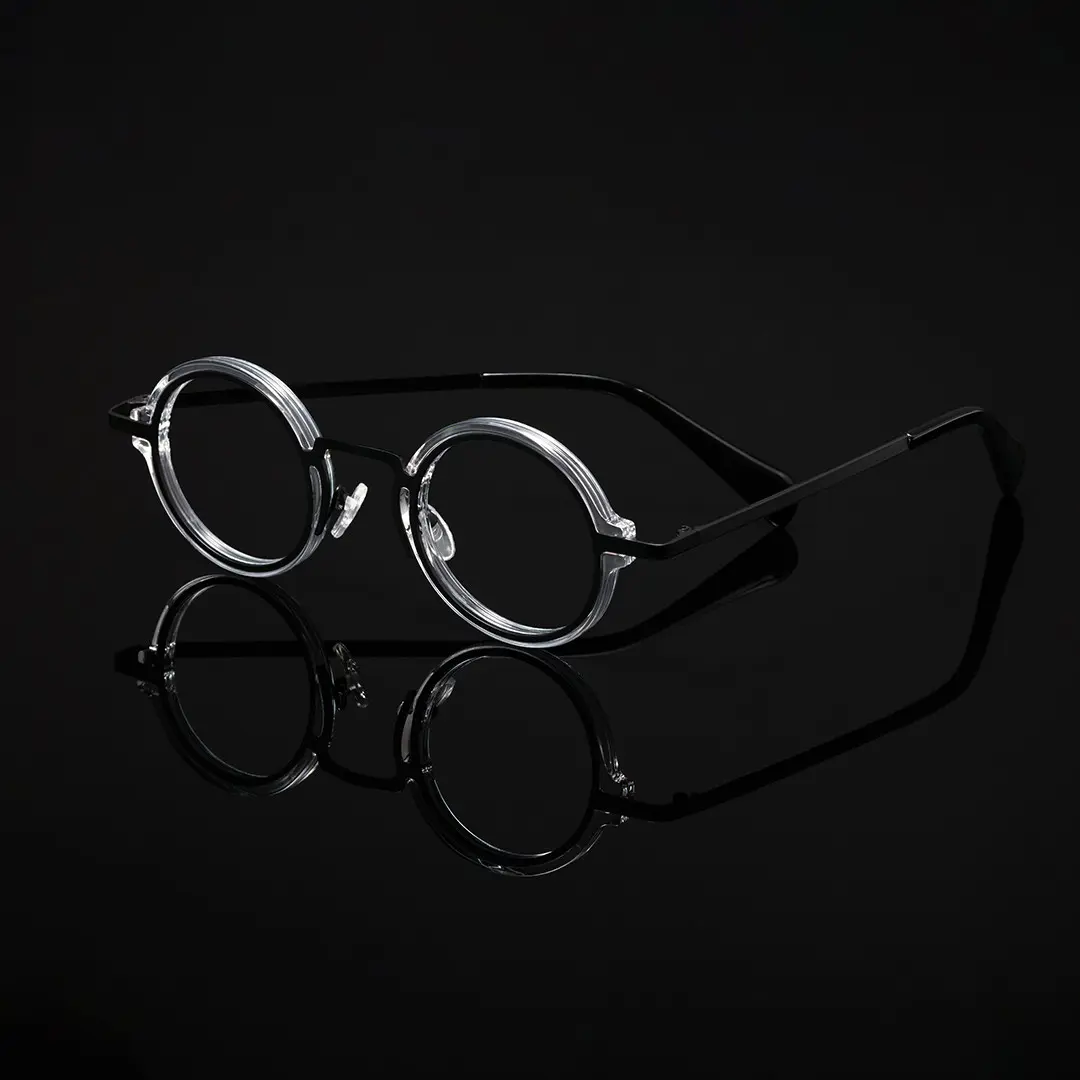 Scene close-up view of Kil vintage round tr90 eyeglasses in blackclear. SPU: RR0312406