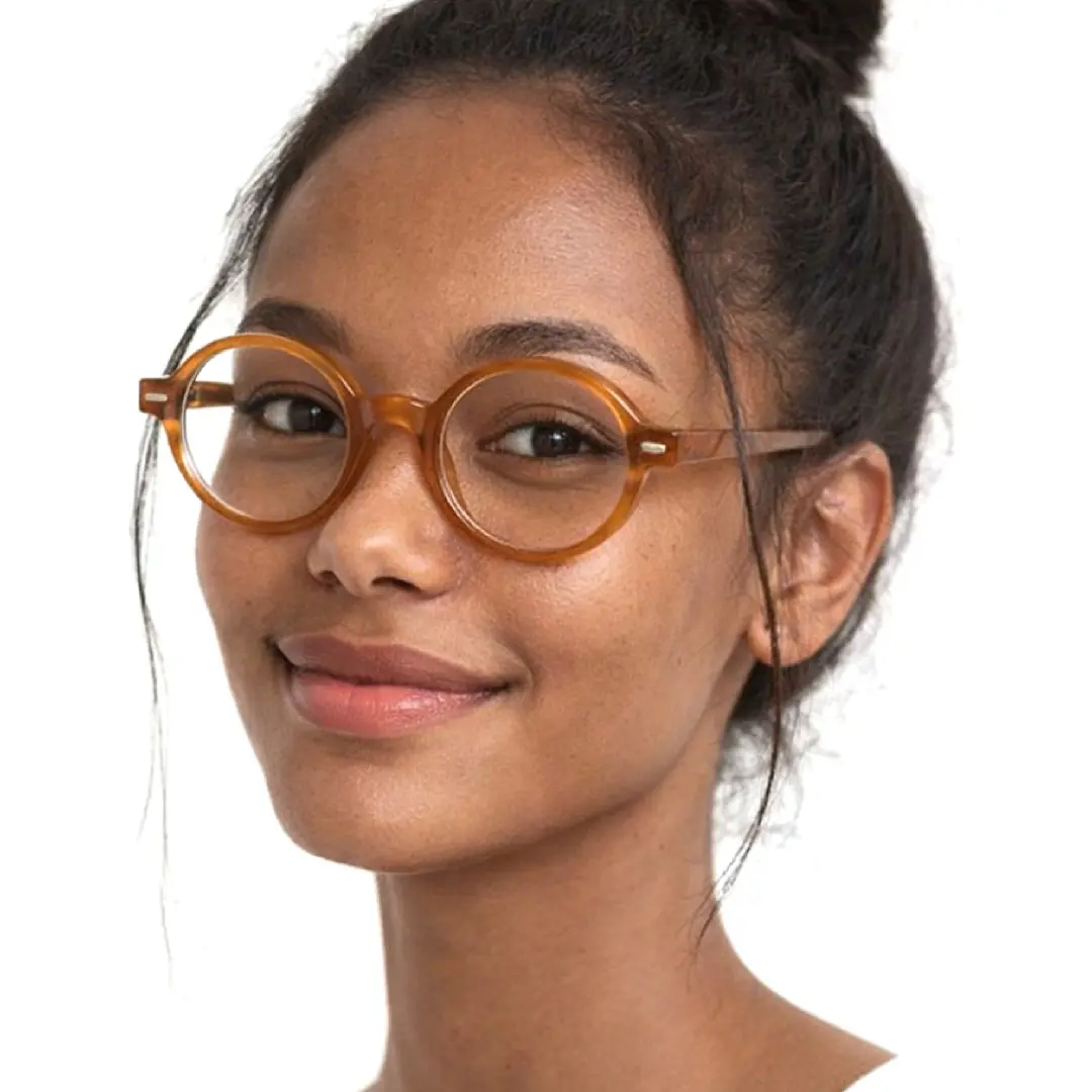 Slightly angled view of female wearing orange round eyeglasses, soft smile, RR0332302