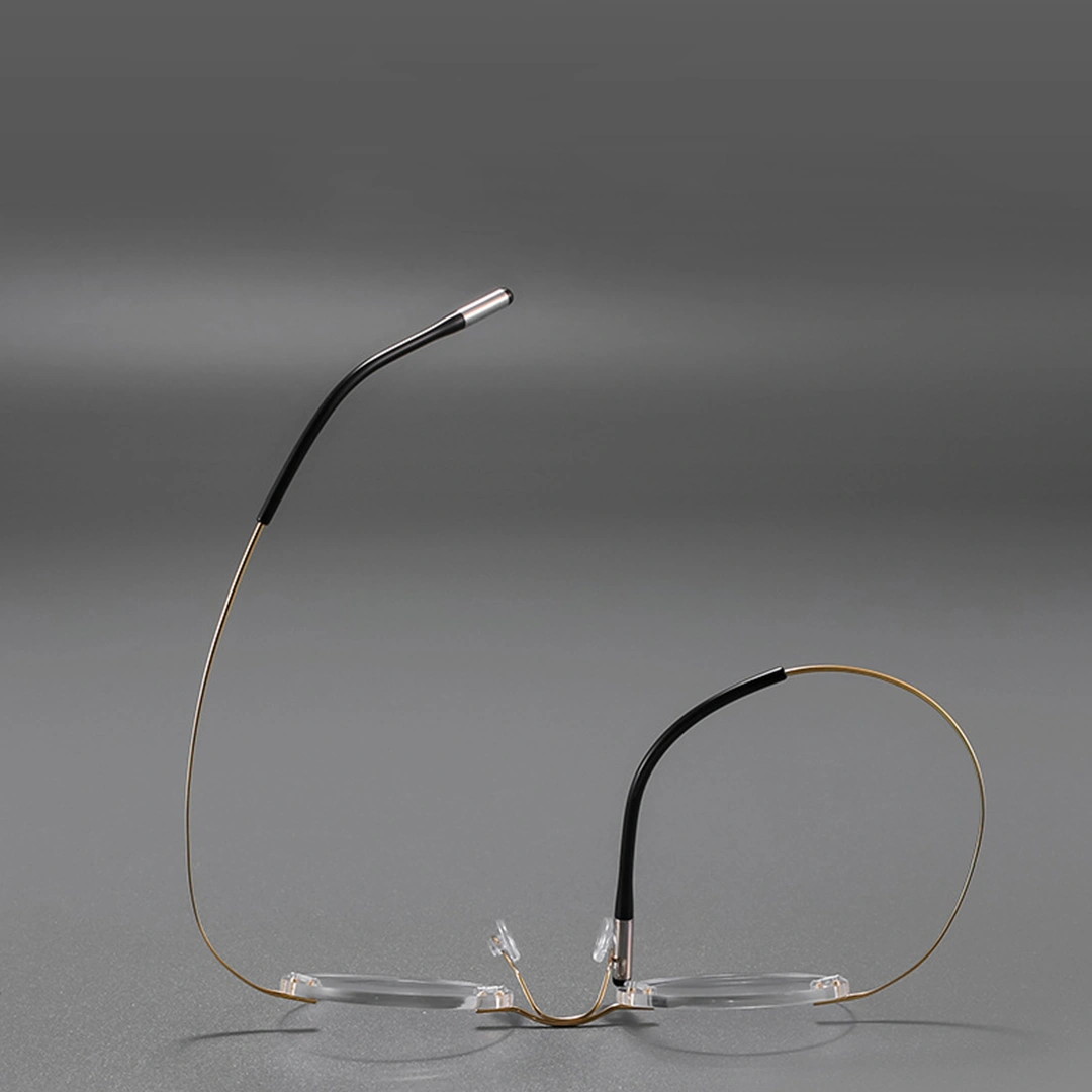 Scene close-up view of Darcy vintage round titanium eyeglasses in gold. SPU: RT0012506