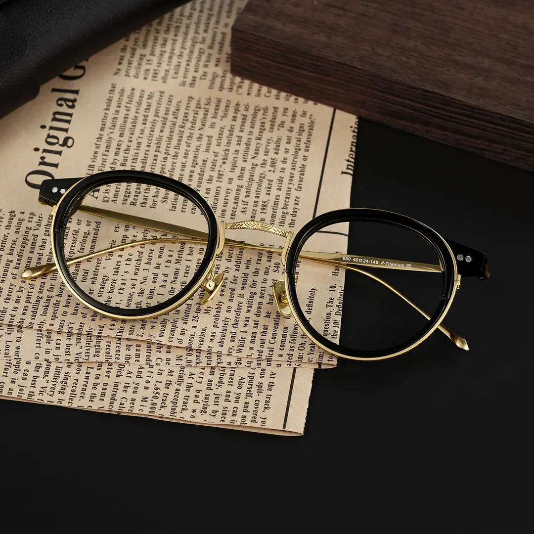 Scene close-up view of Felone vintage round titanium eyeglasses RT0022209 in black