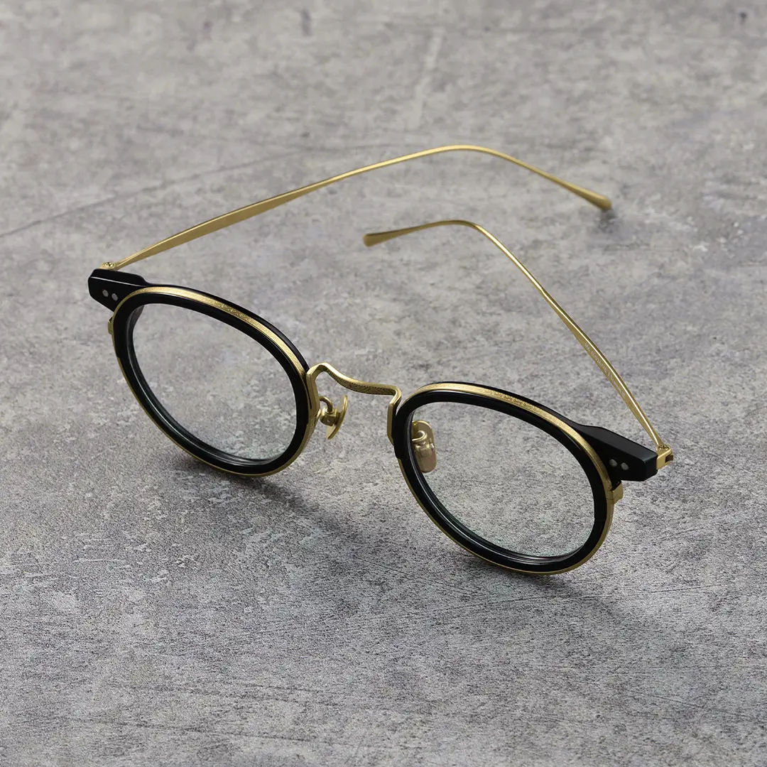 Scene view of Felone vintage round titanium eyeglasses RT0022209 in black