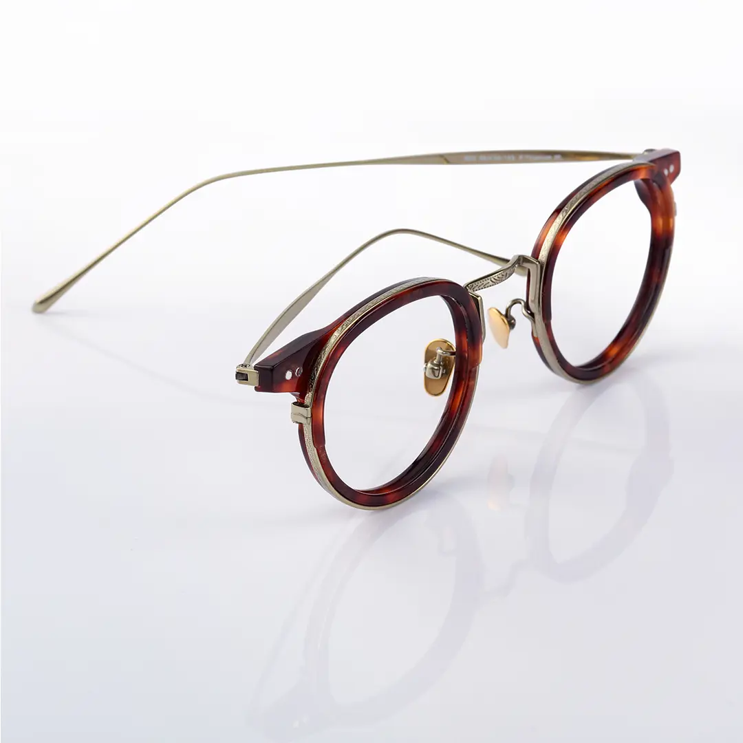 Scene view of Felone vintage round titanium eyeglasses RT0022209 in tortoise