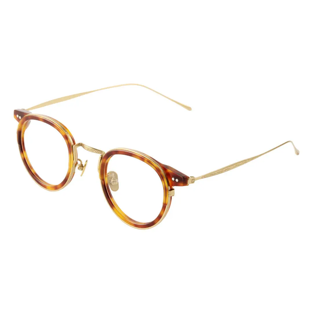 Angle view of Felone vintage round titanium eyeglasses RT0022209 in yellow tortoise