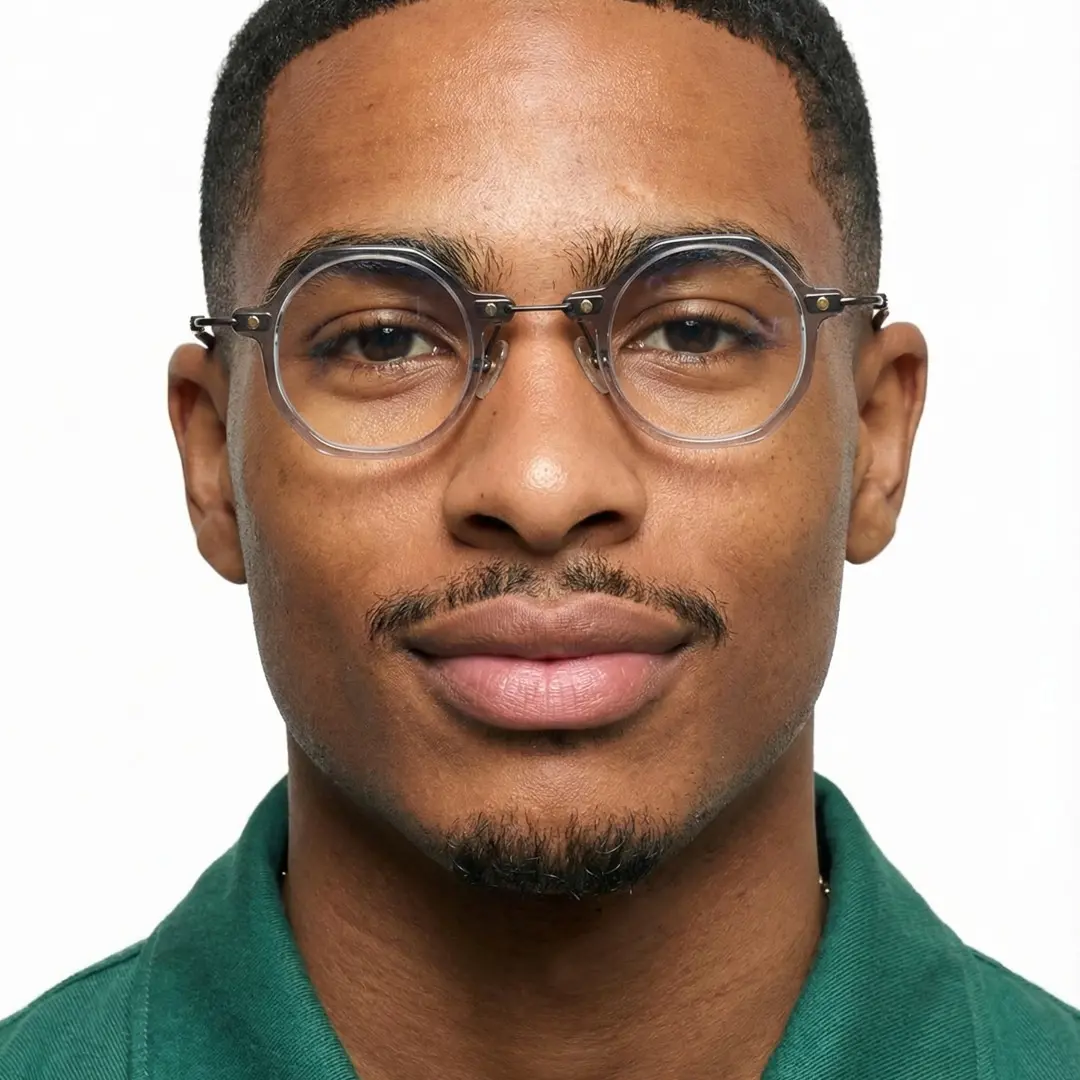 Front view of male wearing steampunk grey round eyeglasses, neutral expression, RT0042306