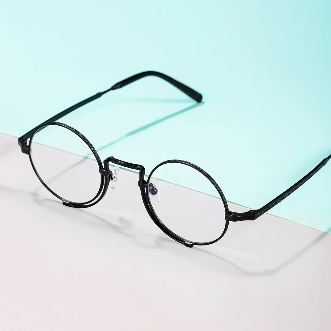 Scene close-up view of Bour steampunk round titanium eyeglasses in black. SPU: RT0052304