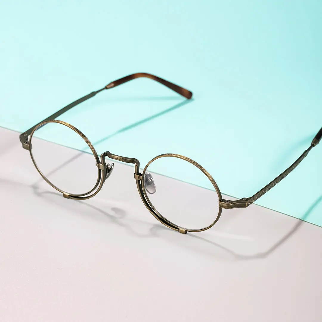 Scene close-up view of Bour steampunk round titanium eyeglasses in bronze. SPU: RT0052304