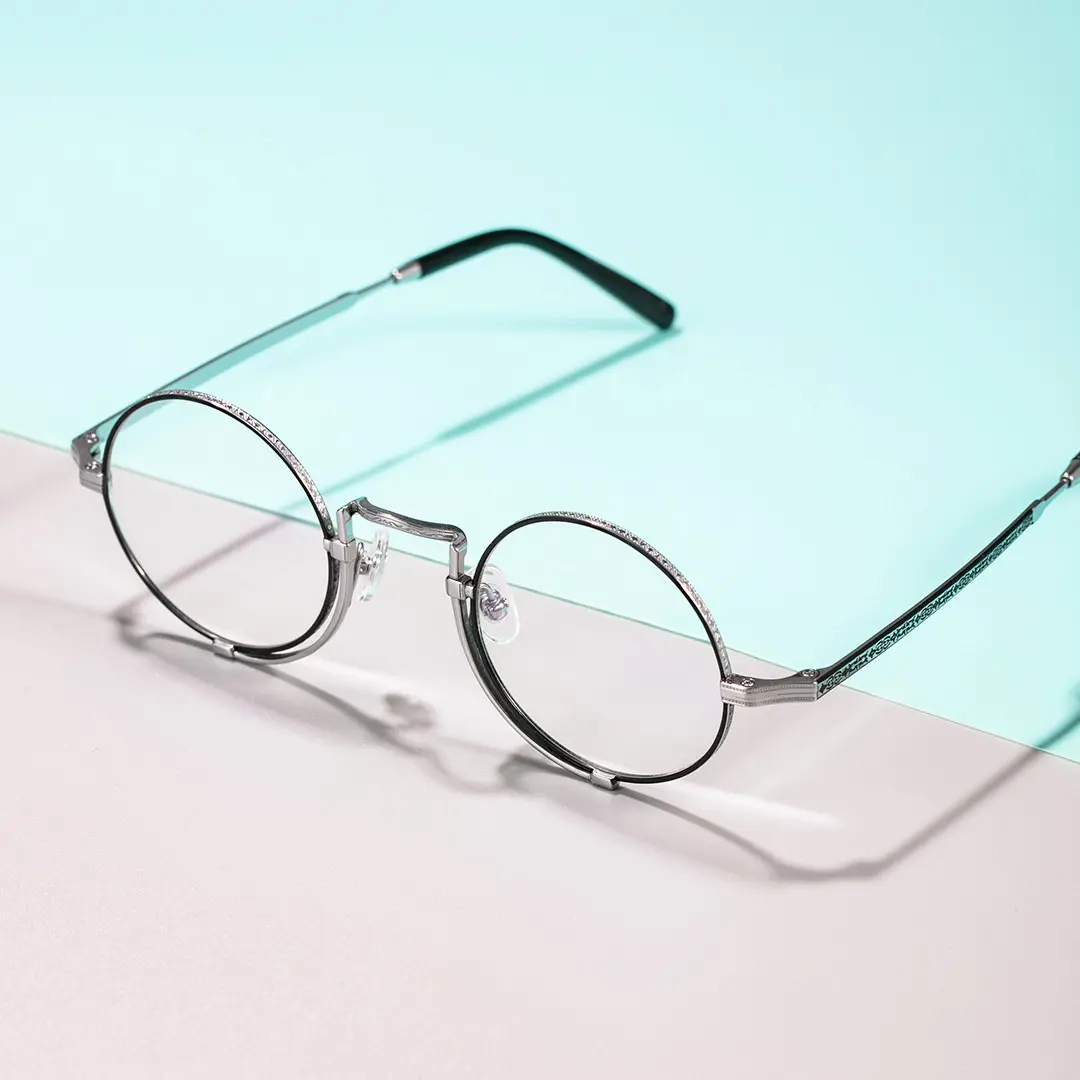 Scene close-up view of Bour steampunk round titanium eyeglasses in grey. SPU: RT0052304