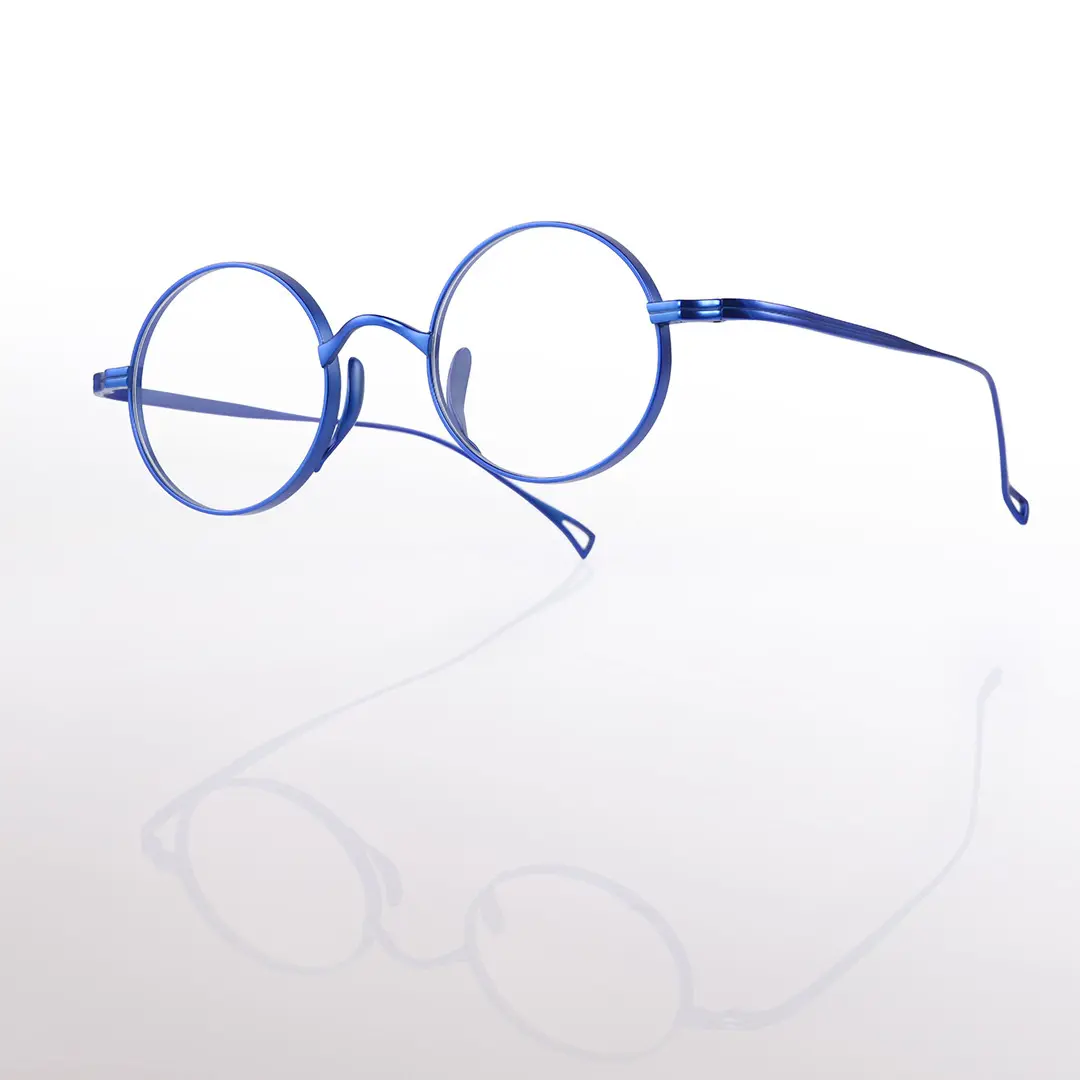 Scene close-up view of Bify round titanium eyeglasses RT0172303 in blue
