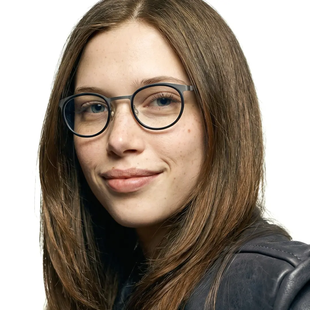 Front view of female wearing silver round eyeglasses, friendly smile, RT0212306