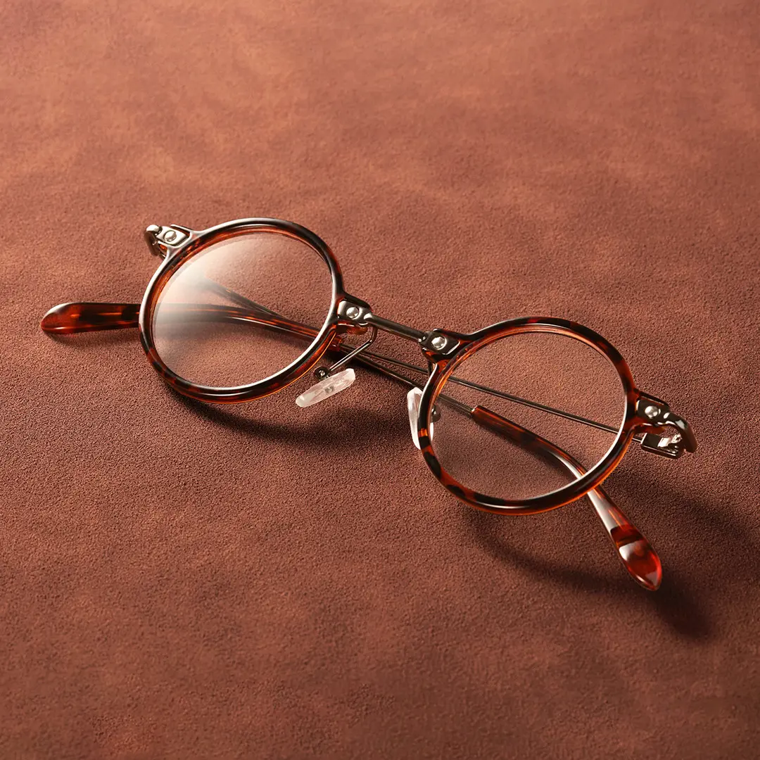 Front folded view of Ivy round titanium eyeglasses RT0302405 in tortoise
