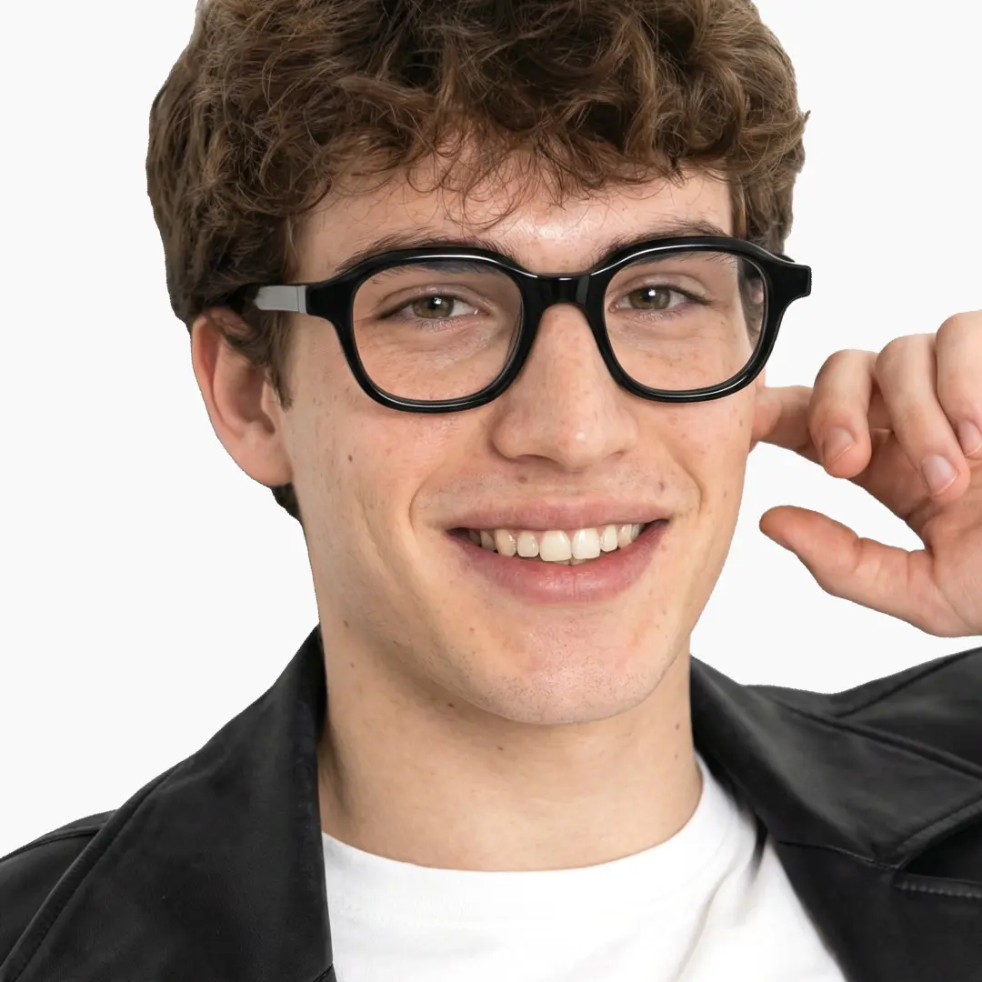 Front view of male wearing black square eyeglasses, hand near face, natural smile, SA0052312