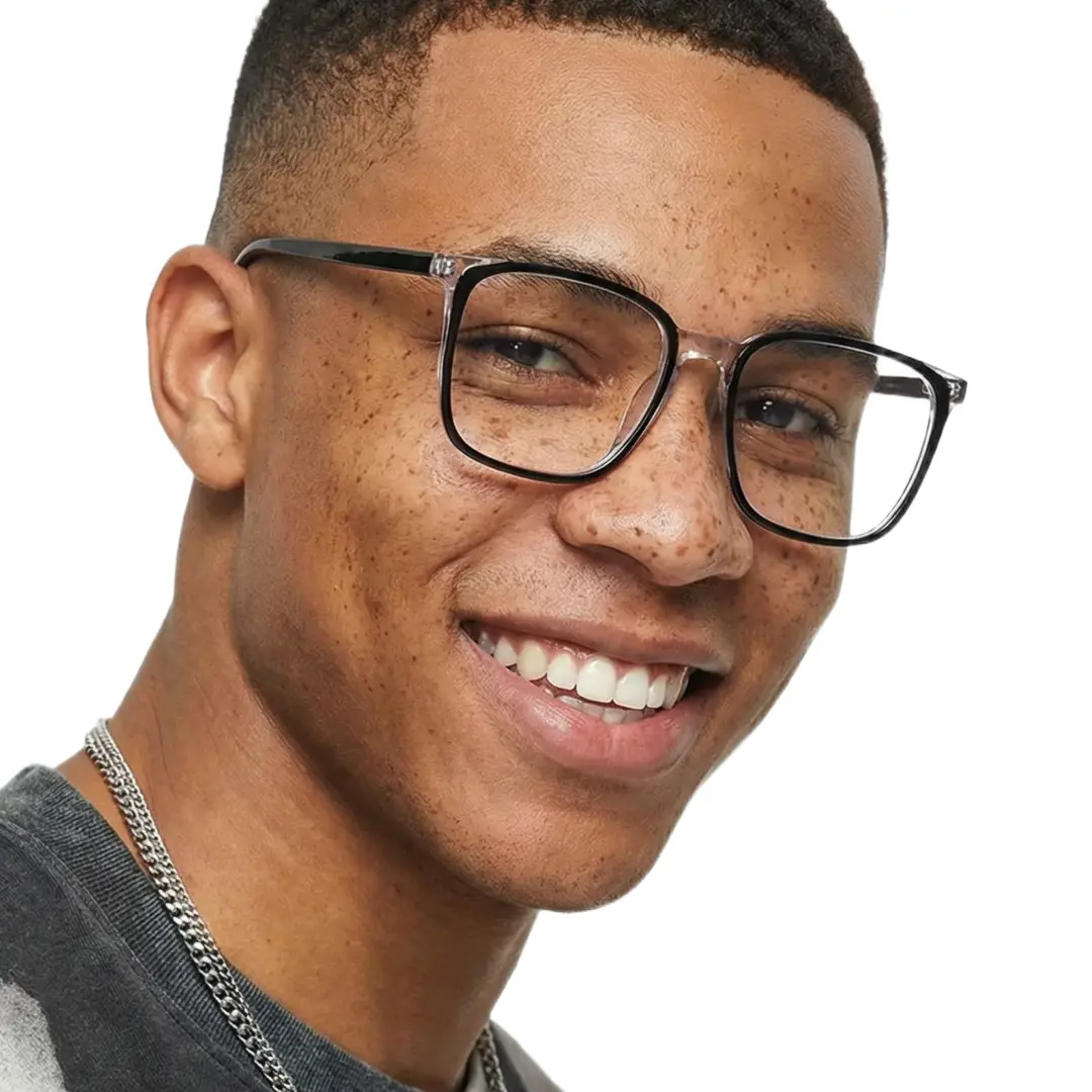 Three-quarter view of male wearing black clear square eyeglasses, smiling, SA0082305