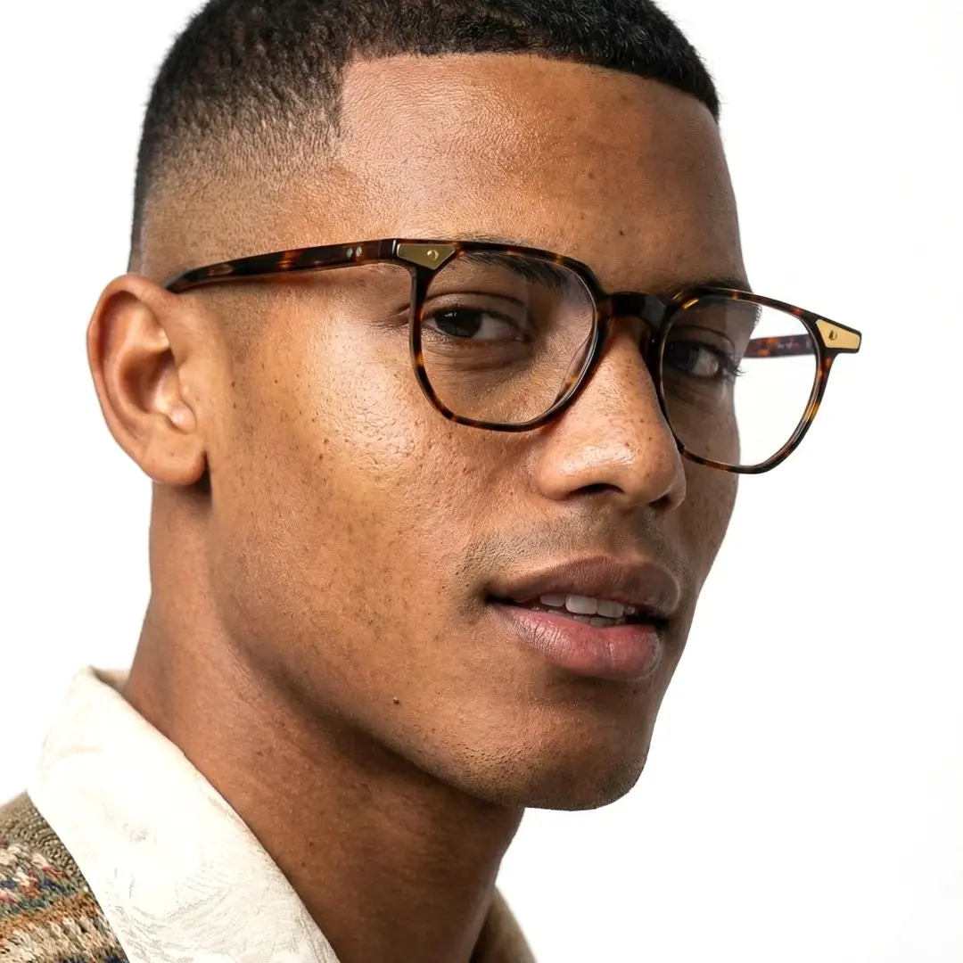 Profile view of male wearing vintage tortoise square eyeglasses, calm expression, SA0092311