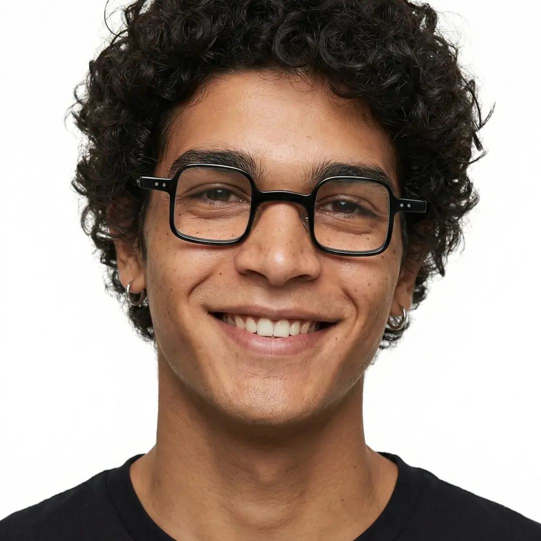 Close-up view of male wearing vintage black square eyeglasses, smiling, SA0102302