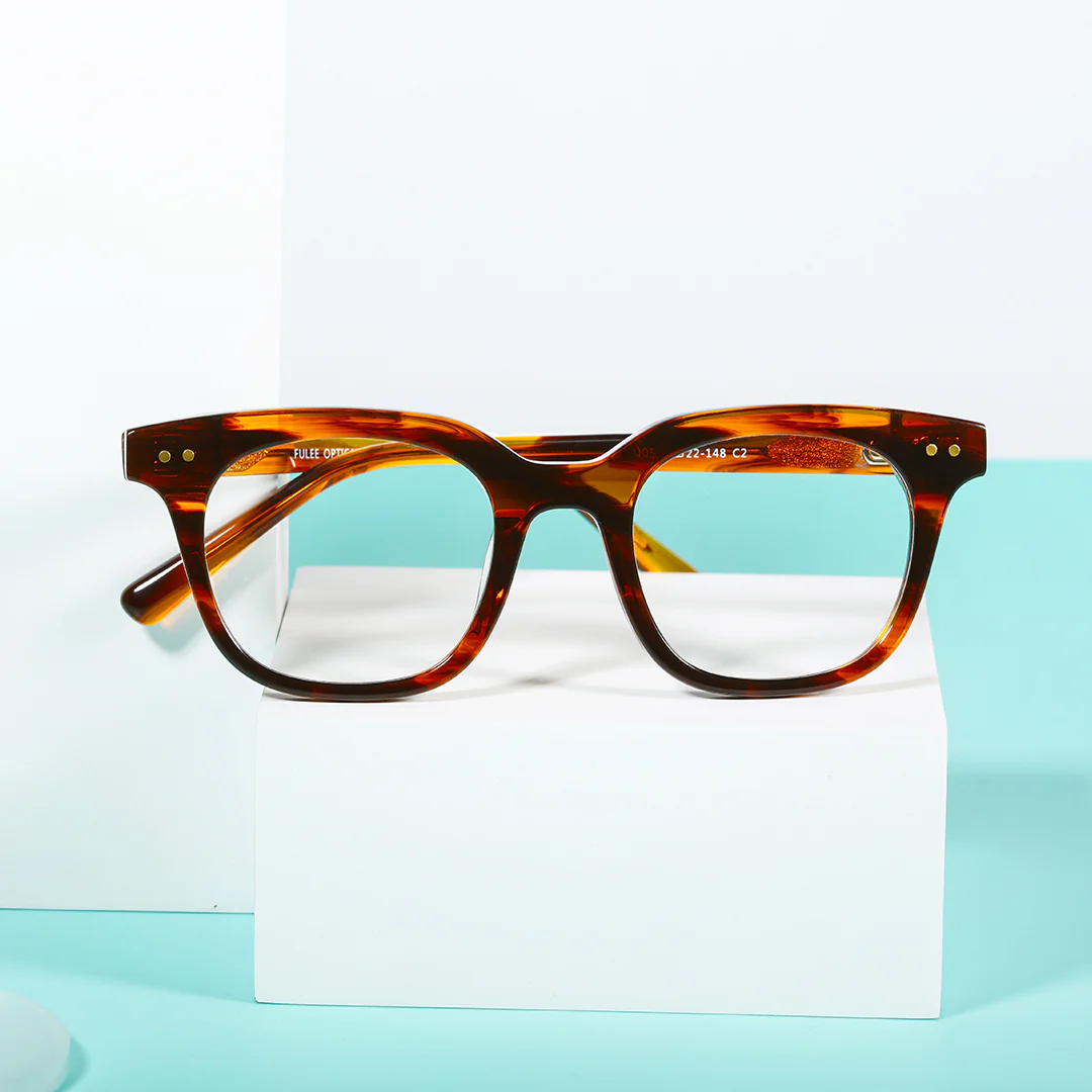 Scene close-up view of Nicolas square acetate eyeglasses SA0102401 in brown tortoise