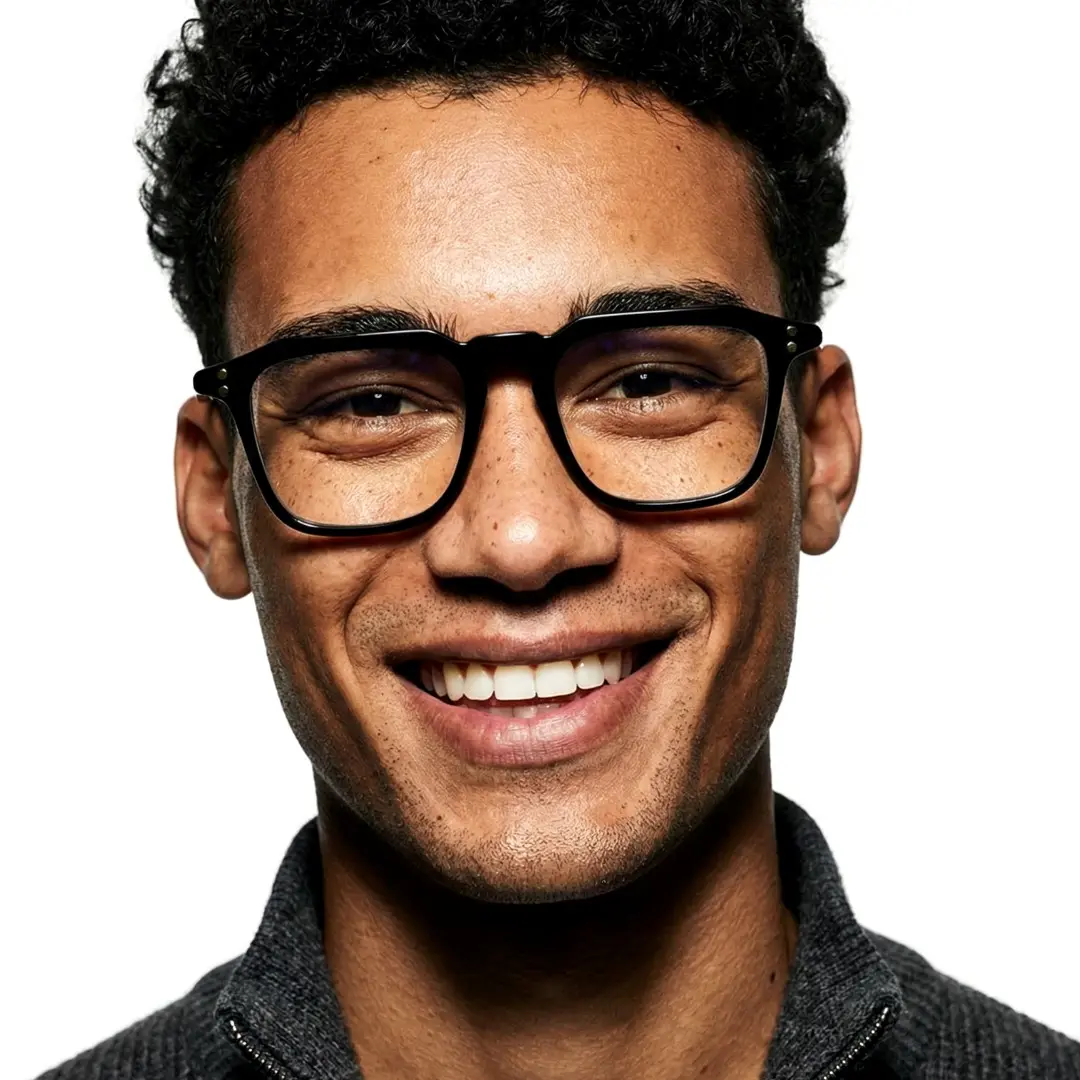 Front view of male wearing black square eyeglasses, smiling, SA0192403