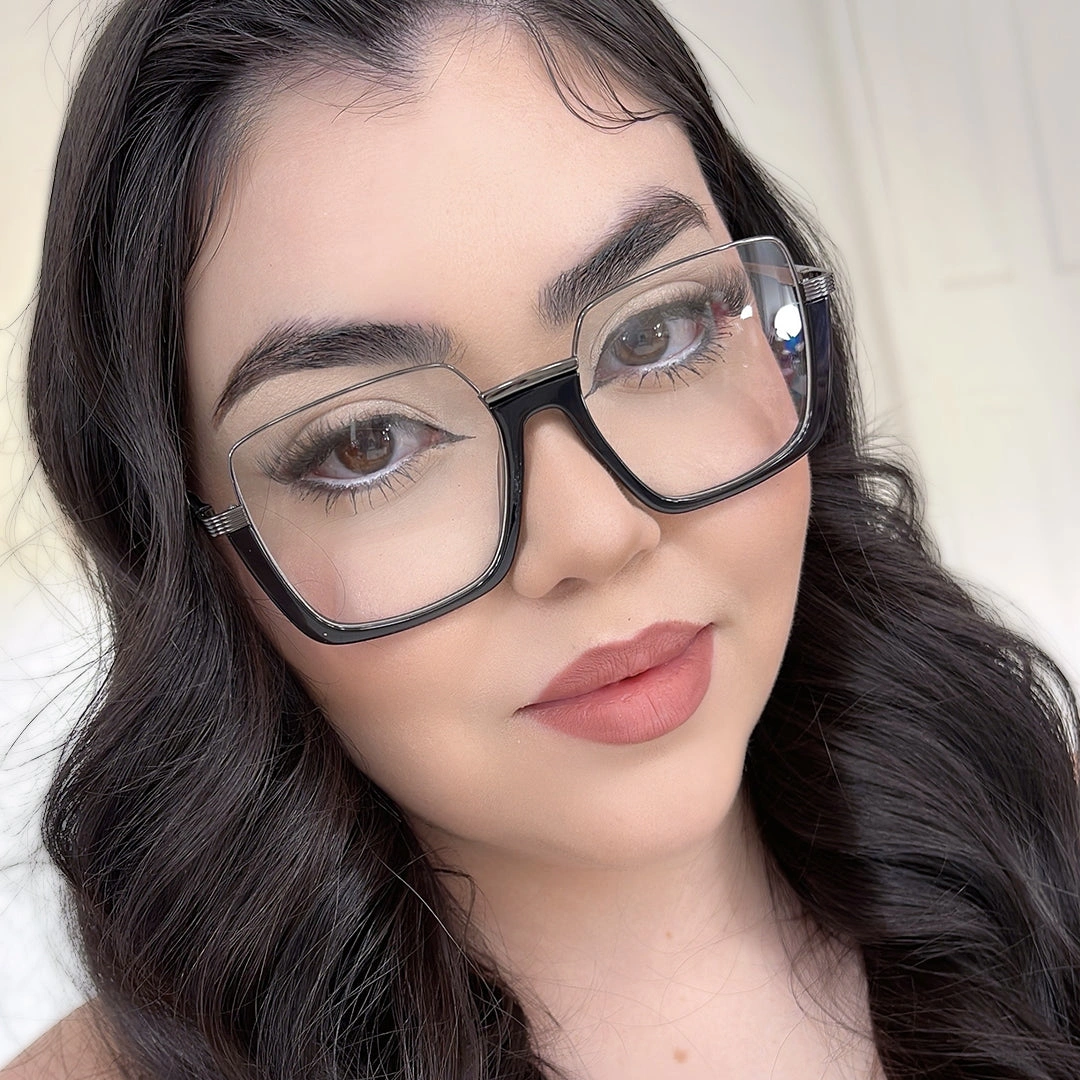 Close-up view of female wearing fashion black square eyeglasses, natural expression, SA0382503