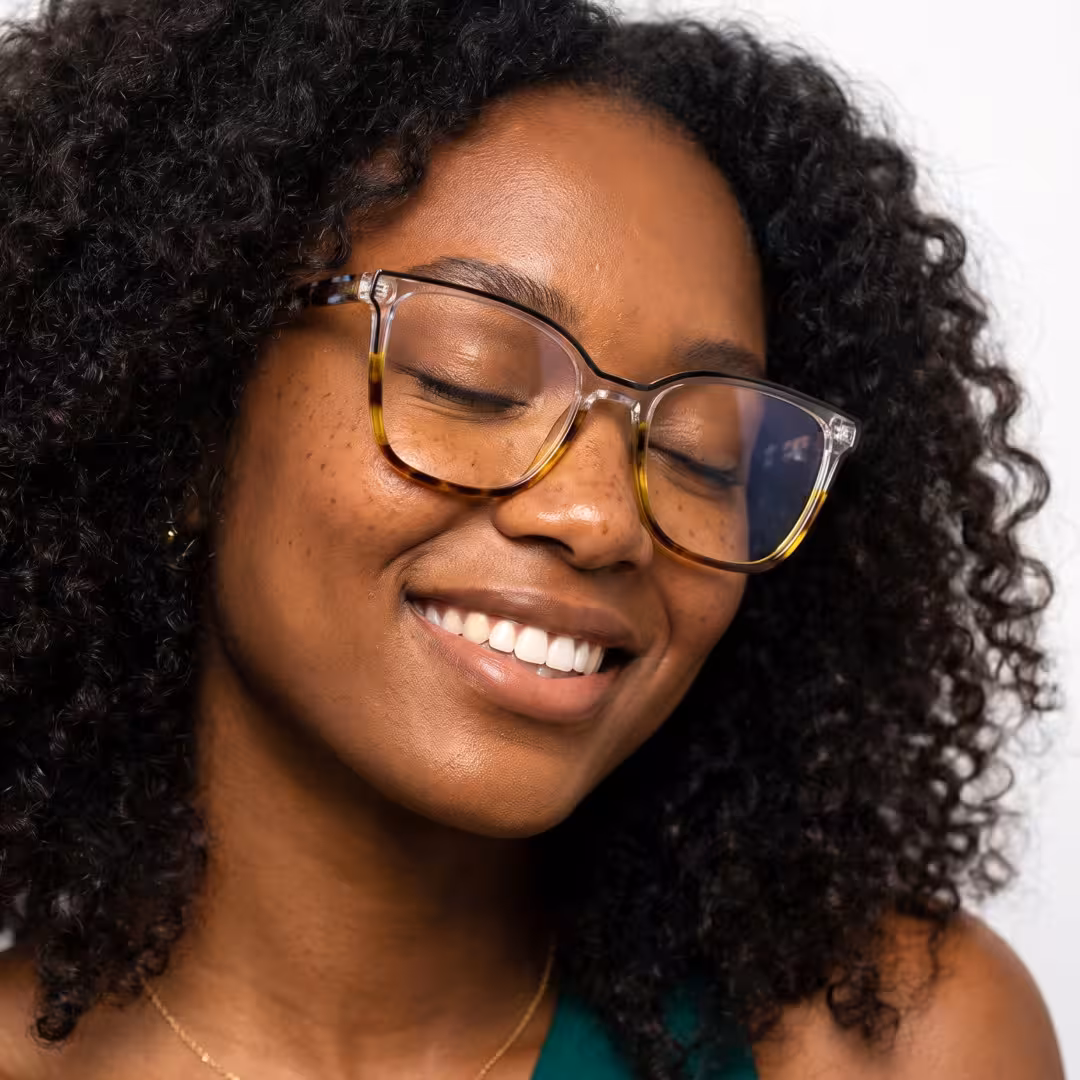 Female wearing colorful blue tortoise square acetate eyeglasses, natural smile. SPU: SA0382605