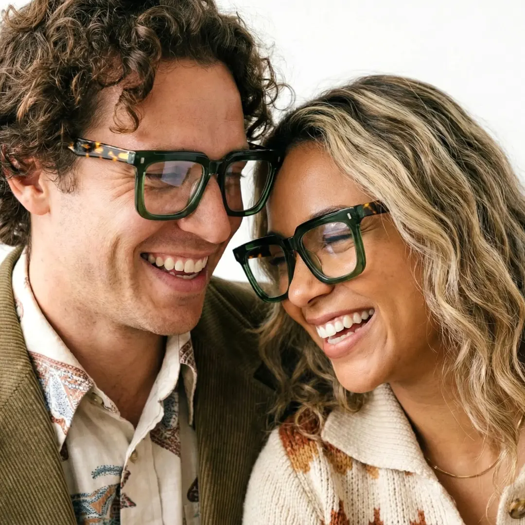 Three-quarter view of couple wearing green square eyeglasses, various expressions, SA0412504