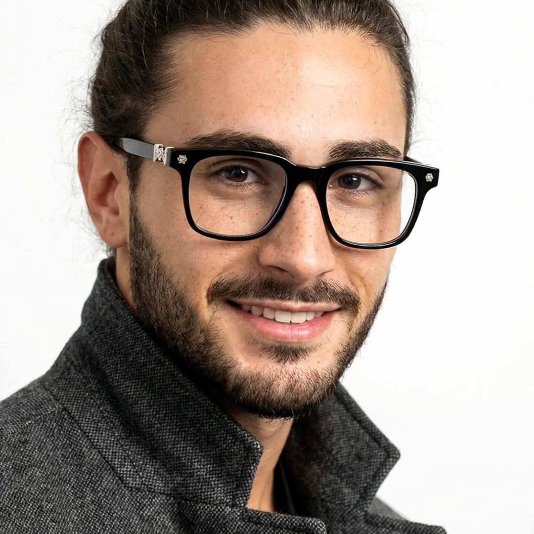 Over-the-shoulder view of male wearing fashion black square eyeglasses, natural smile, SA0432509