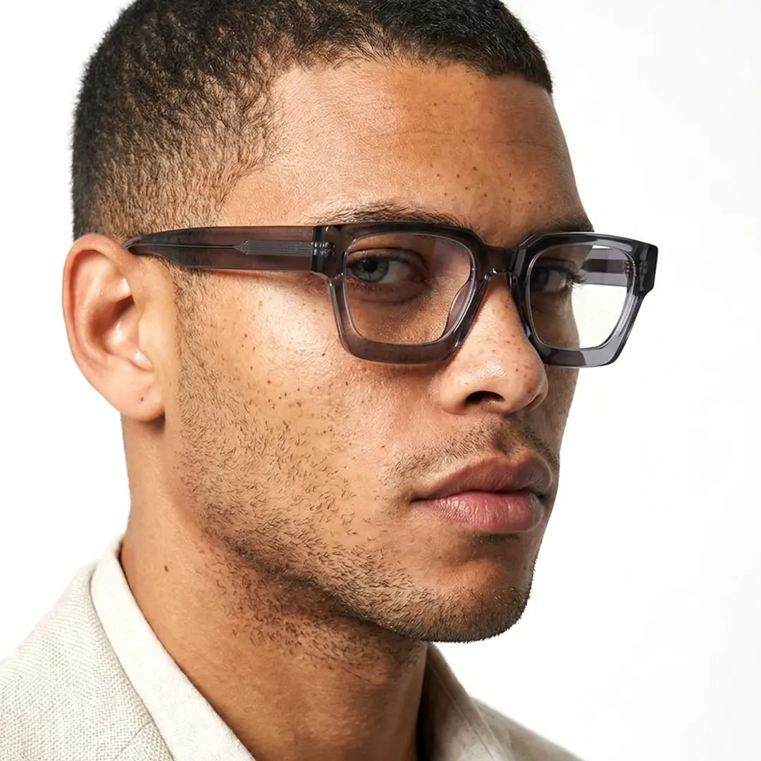 Portrait view of male wearing grey square eyeglasses, natural expression, SA0552302
