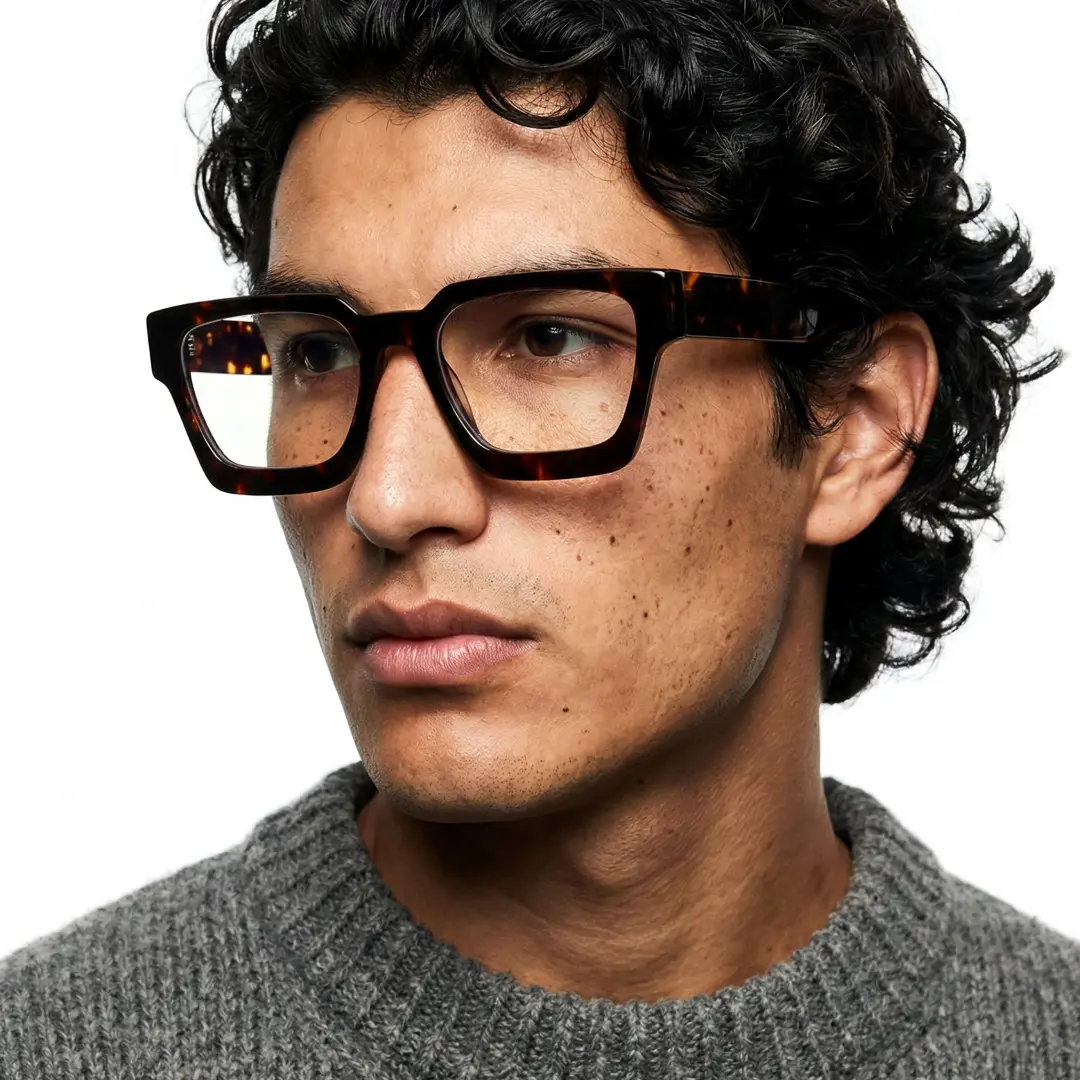 Looking away view of male wearing tortoise square eyeglasses, calm expression, SA0552302
