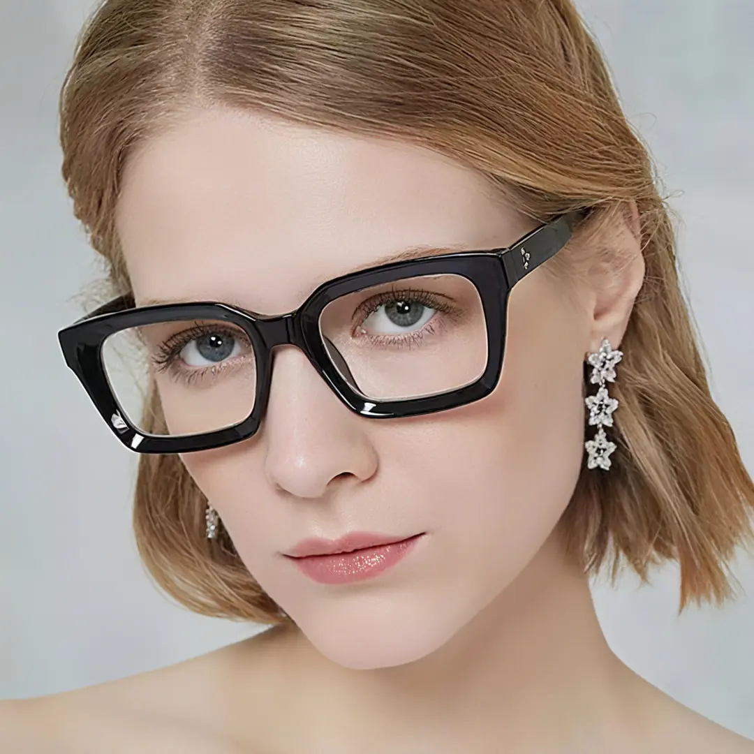 Face close-up view of female wearing black square eyeglasses, neutral expression, SA0602302