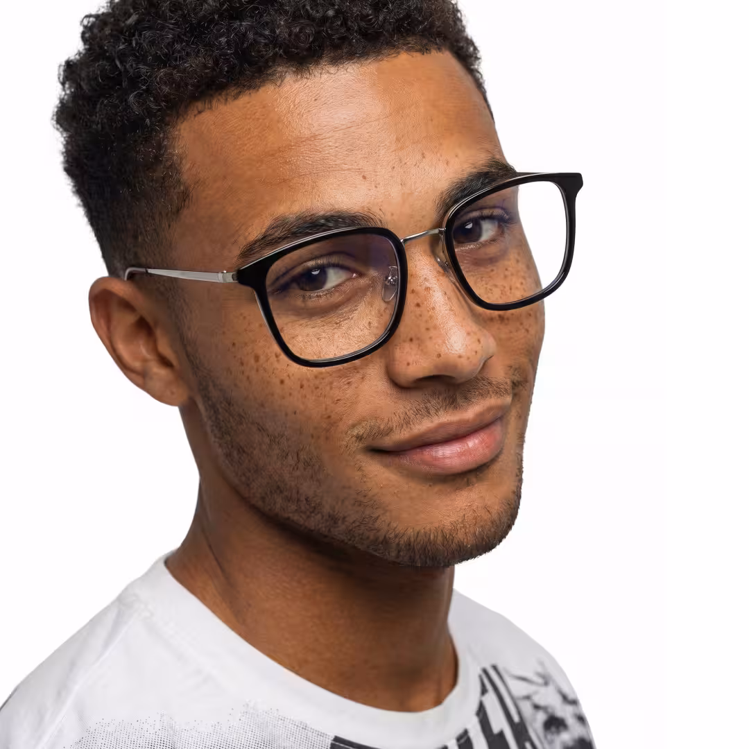 Male wearing black square metal eyeglasses, natural smile. SPU: SM0102605