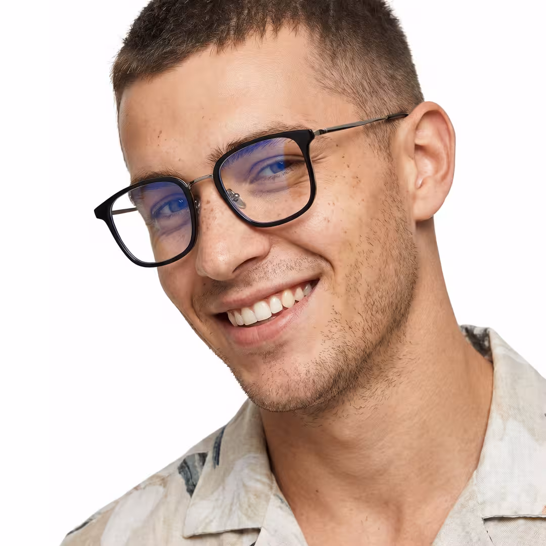 Male wearing black square metal eyeglasses, smiling. SPU: SM0102605