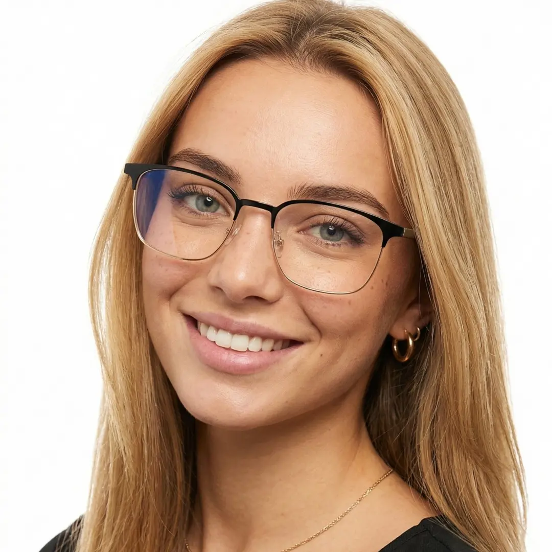 Tilted head view of female wearing black & gold square eyeglasses, natural smile, SM0232409