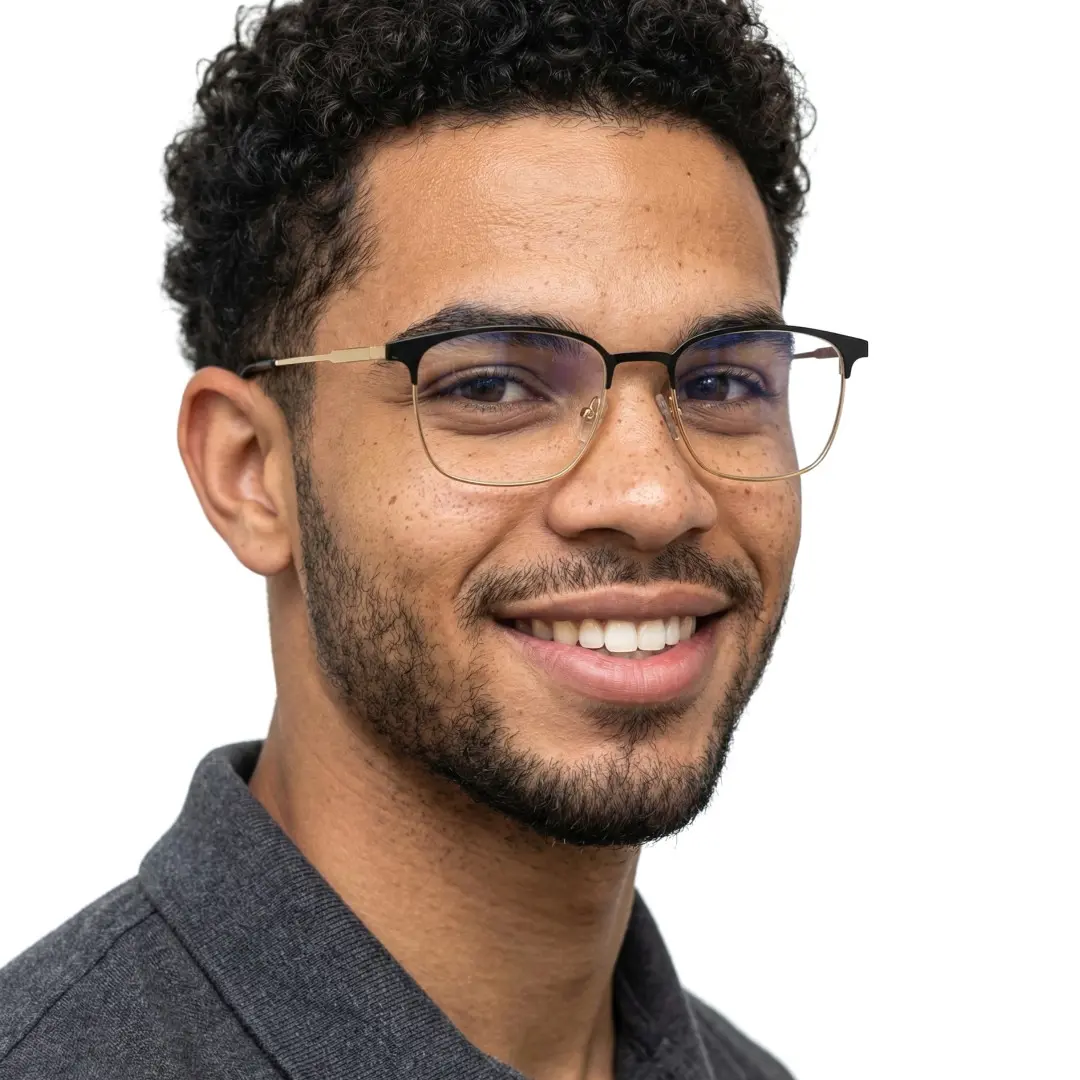 Slightly angled view of male wearing black gold square eyeglasses, smiling, SM0232409