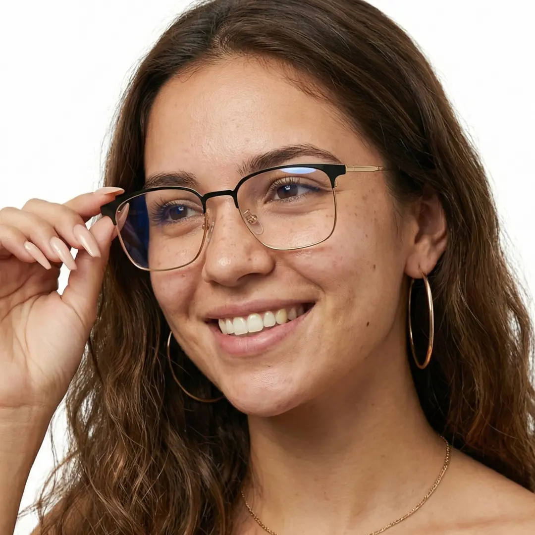 Three-quarter view of female wearing black gold square eyeglasses, adjusting glasses, natural smile, SM0232409