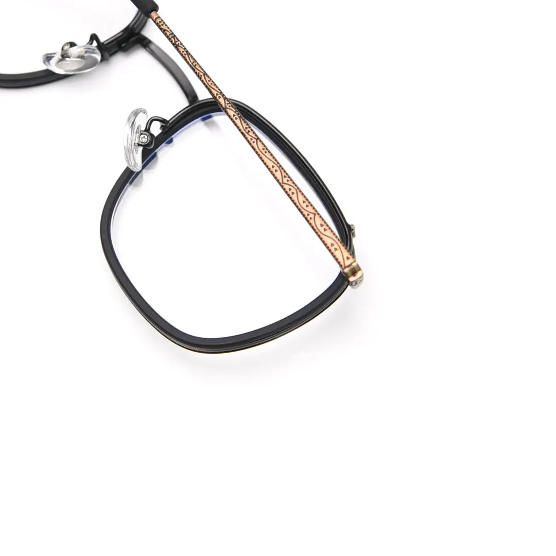 Adjustable nose pad detail of Benin vintage square metal eyeglasses SM0252302 in black brown