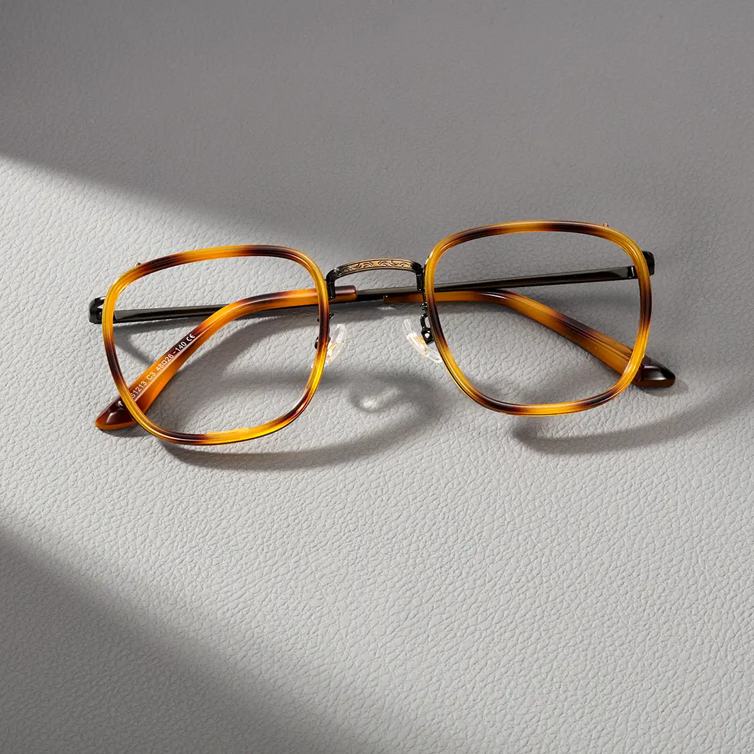 Scene close-up view of Benin vintage square metal eyeglasses SM0252302 in yellow tortoise