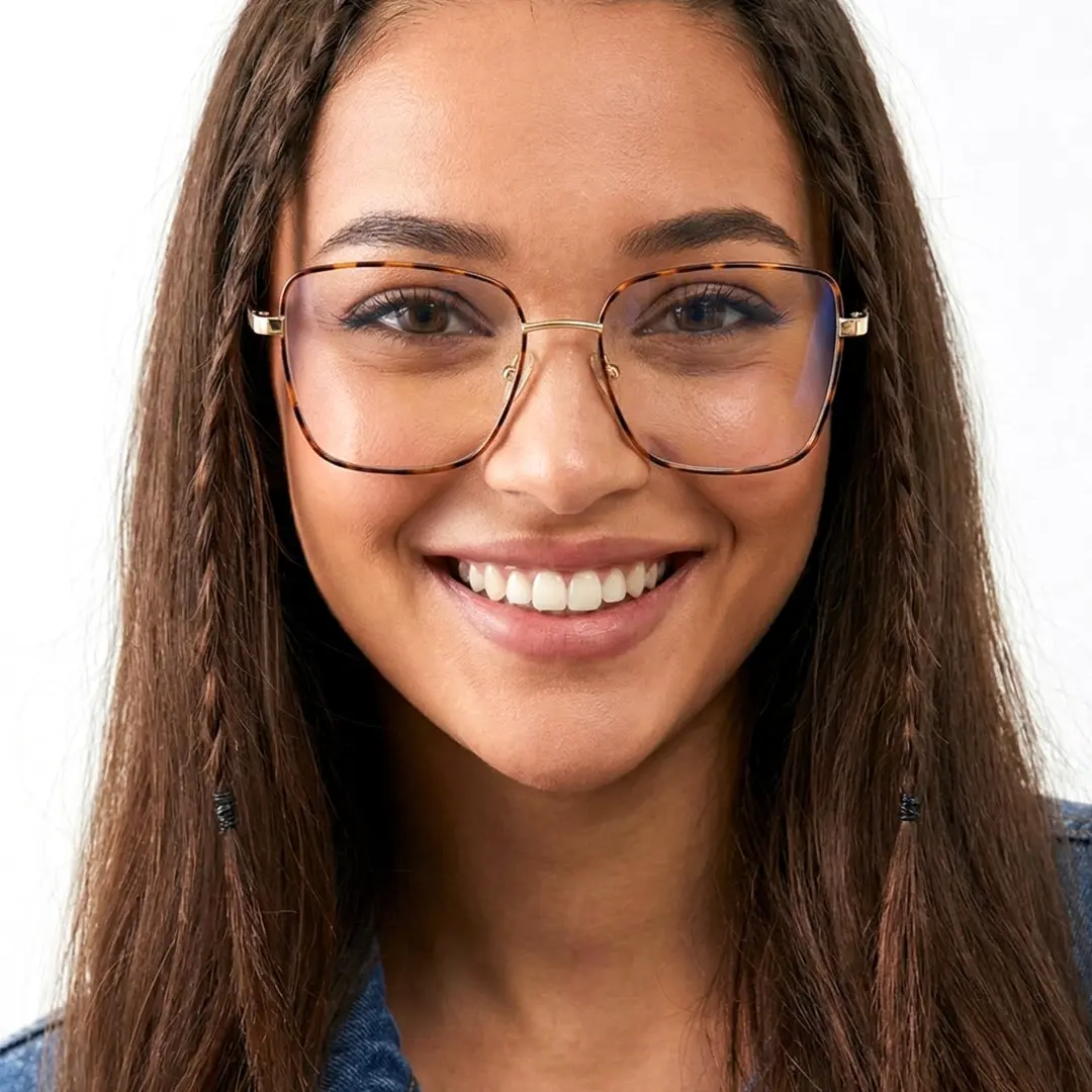 Front view of female wearing tortoise square eyeglasses, natural smile, SM0342508