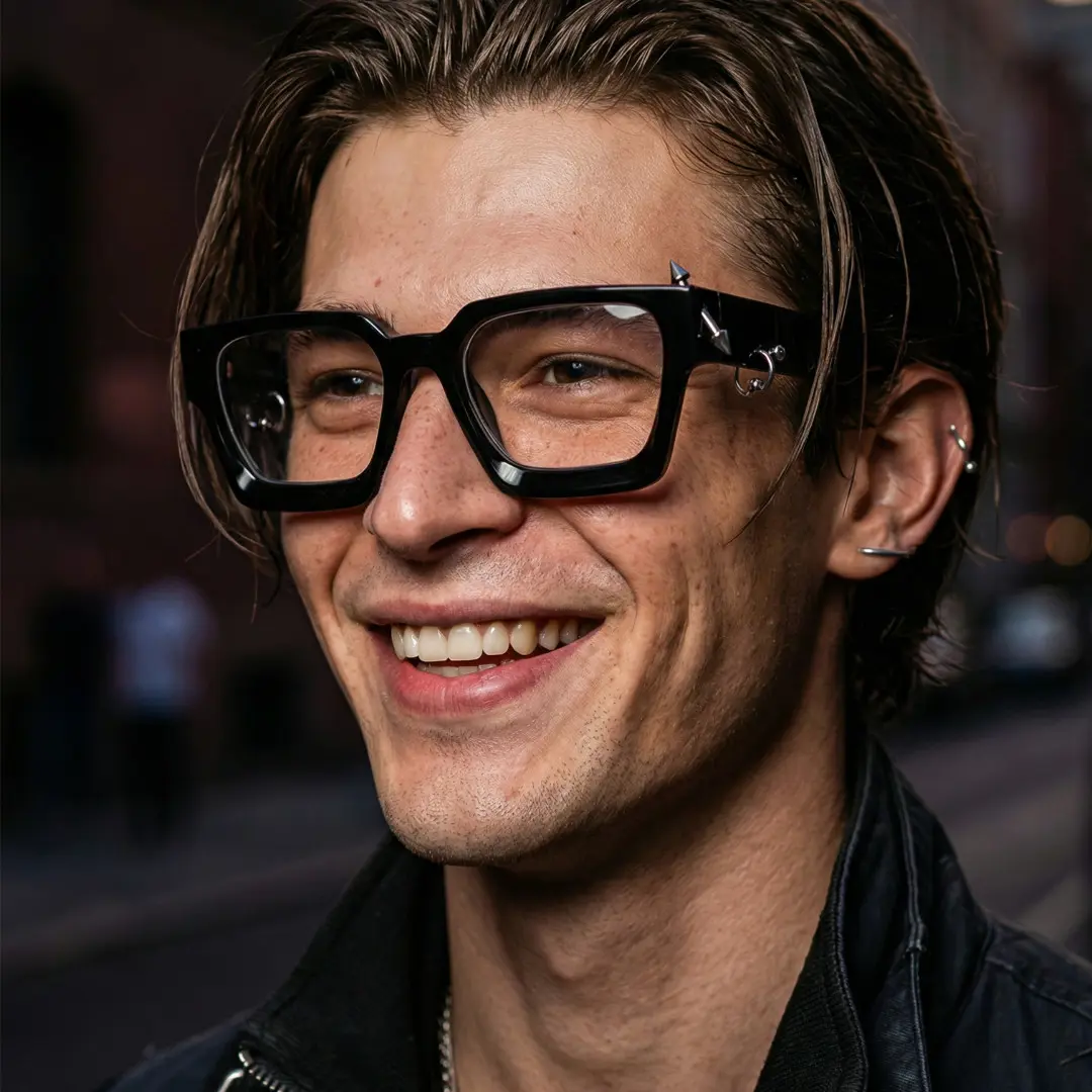 Three-quarter view of male wearing black square handcrafted polarized eyeglasses, natural smile, SP0012511