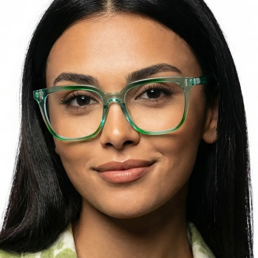 Looking straight ahead view of female wearing green square eyeglasses, smiling, SP0042304