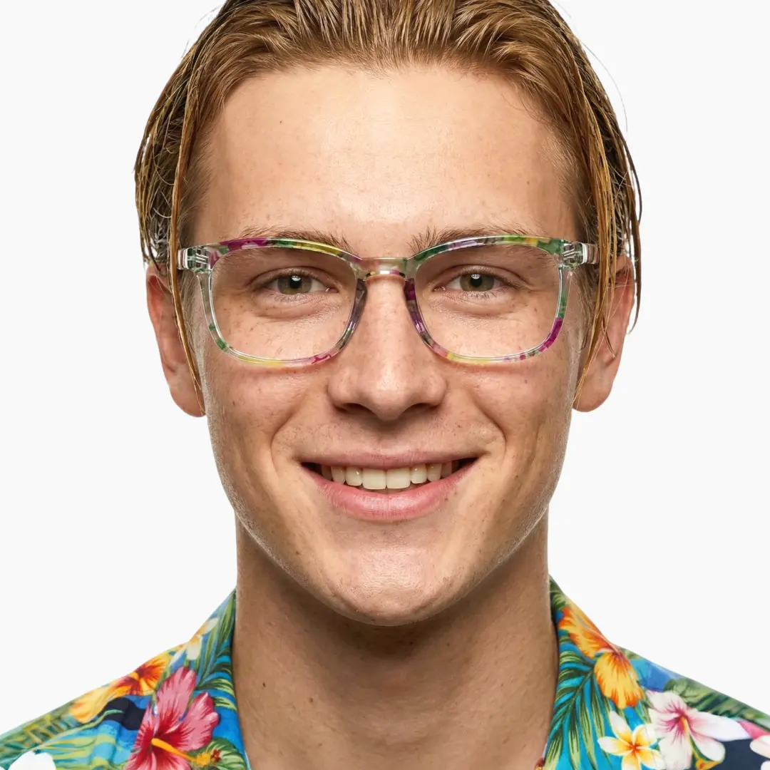 Front view of male wearing green square eyeglasses, natural smile, SP0112308