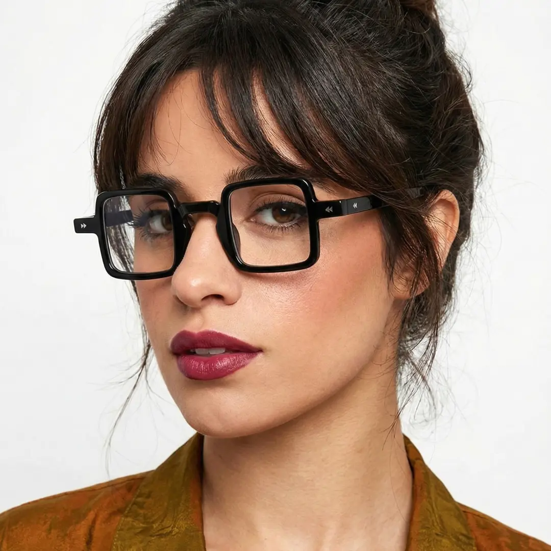 Three-quarter view of female wearing black square eyeglasses, neutral expression, SP0352411