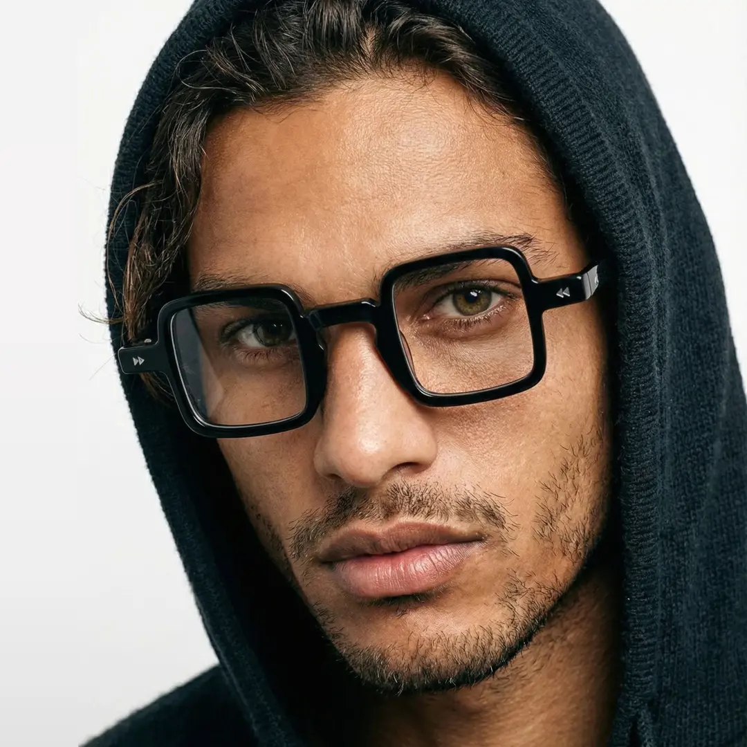 Front view of male wearing vintage black square eyeglasses, calm expression, SP0352411