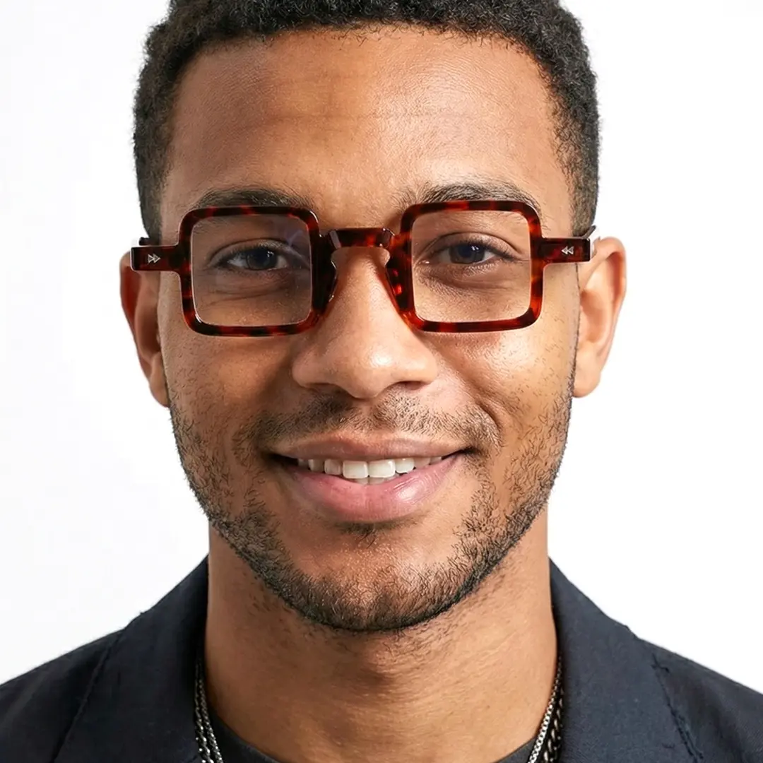 Front view of male wearing tortoise square eyeglasses, natural smile, SP0352411