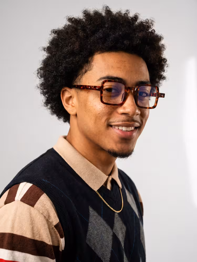 Male model wearing vintage tortoise square pc eyeglasses in a clean studio setting. SPU: SP0352411