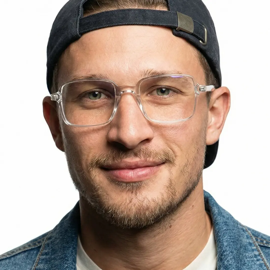 Front view of male wearing vintage clear square eyeglasses, natural smile, SR0022508
