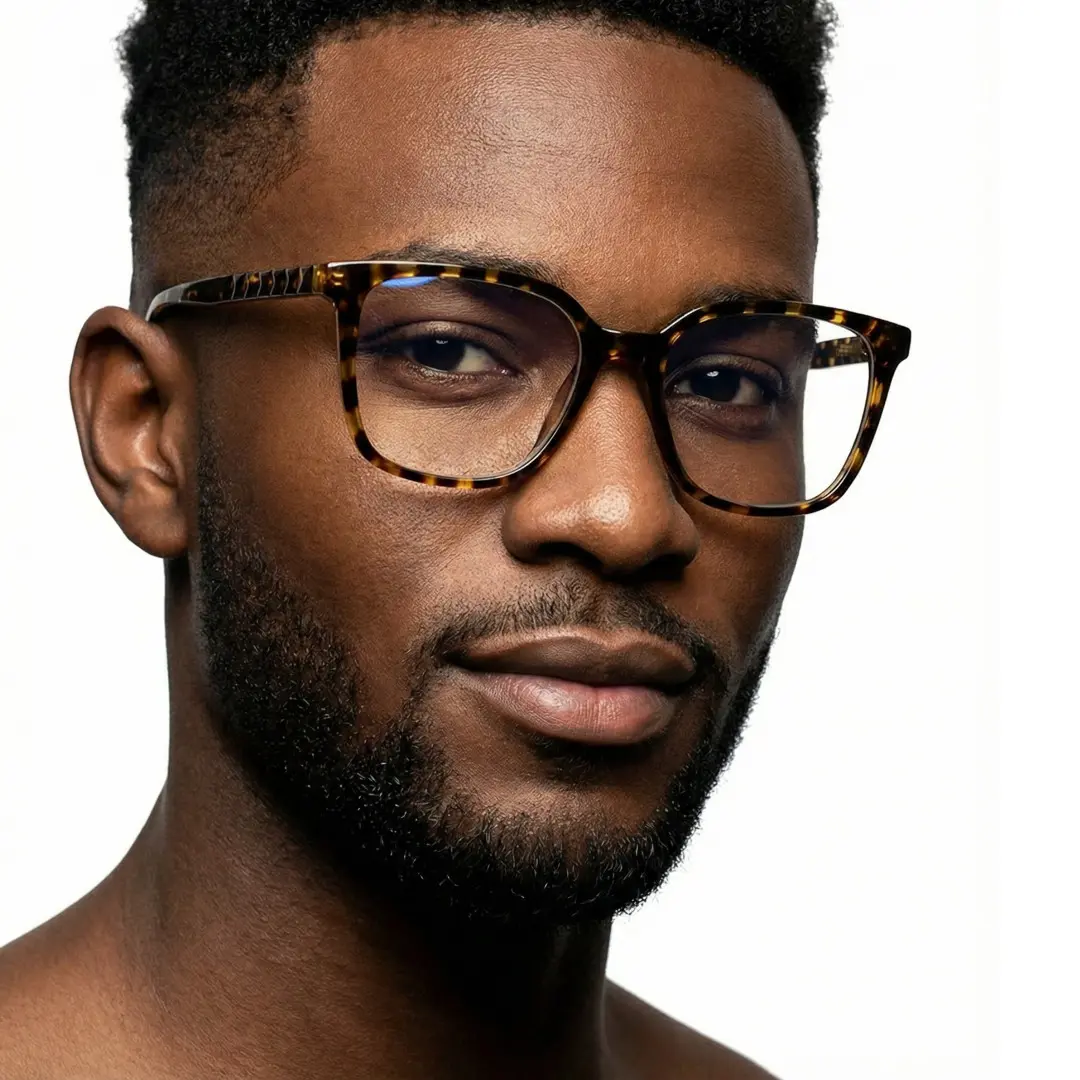 Three-quarter view of male wearing tortoise square eyeglasses, neutral expression, SR0022510