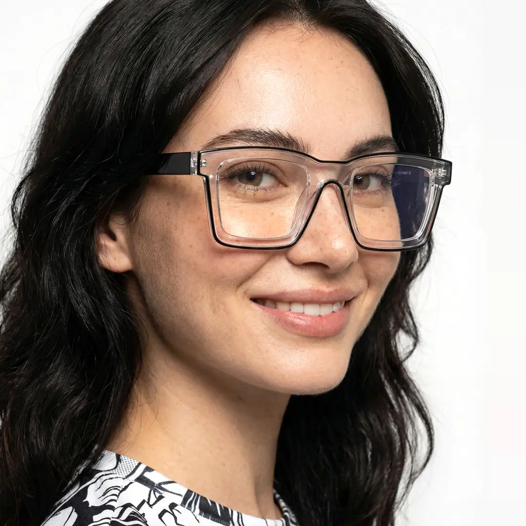 Profile view of female wearing clear square eyeglasses, natural smile, SR0032307
