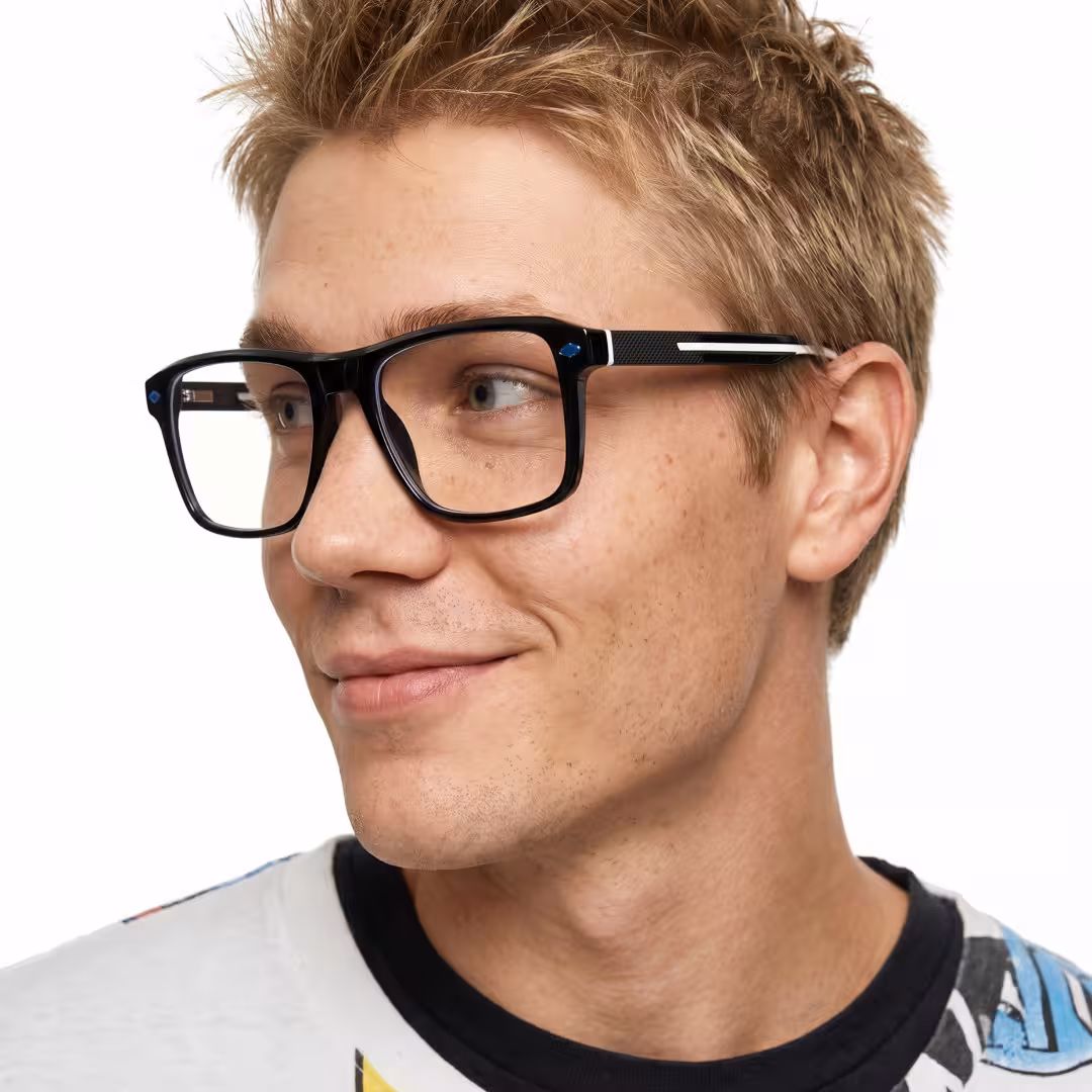 Male wearing black square tr90 eyeglasses, soft smile. SPU: SR0032605