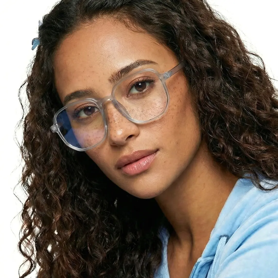 Slightly angled view of female wearing grey square eyeglasses, neutral expression, SR0052410